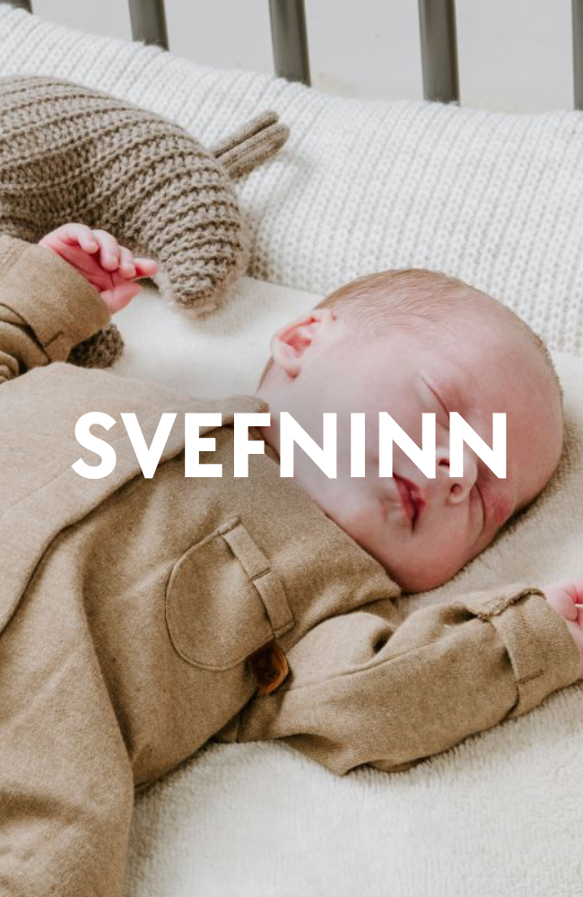 Mynd af sofandi barni. Texti á mynd er "SVEFNINN"